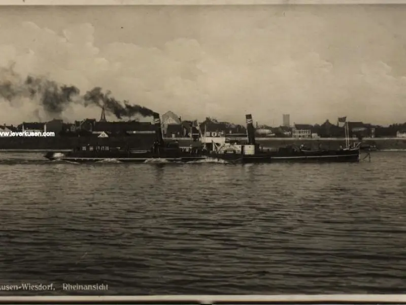 Rhein mit Schaufelradbagger